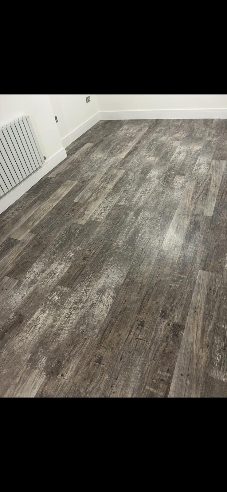 Durable commercial-grade vinyl plank flooring installed by Compass Flooring Norfolk